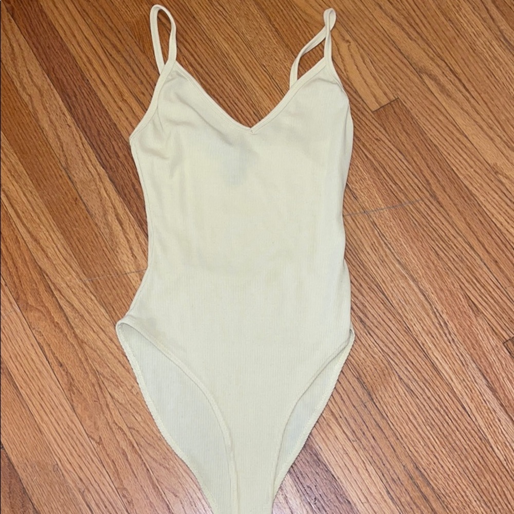 Yellow body suit